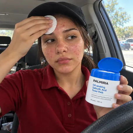 Wiping the forehead with a pad in the car